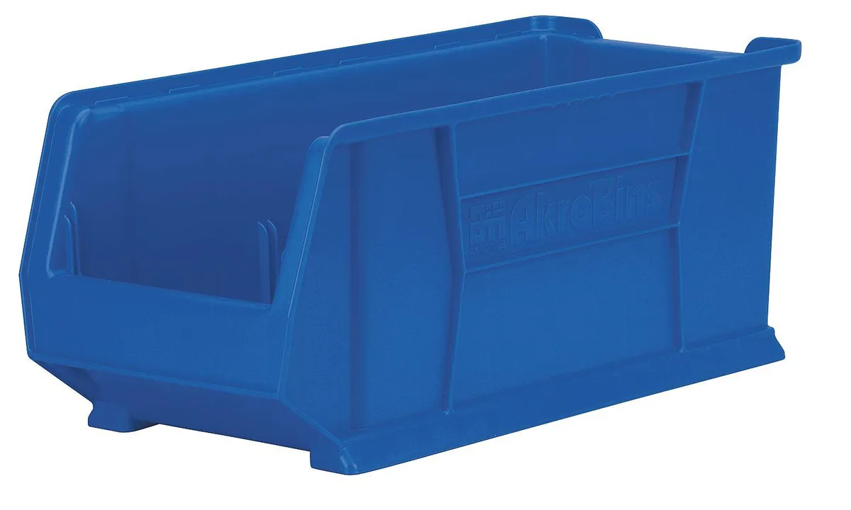 Blue plastic storage bin, rectangular with handle and label area