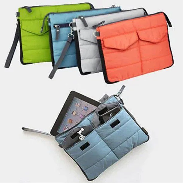 Grey nylon pouch insert with multiple pockets and zip closures, 11 by 8.5 inches