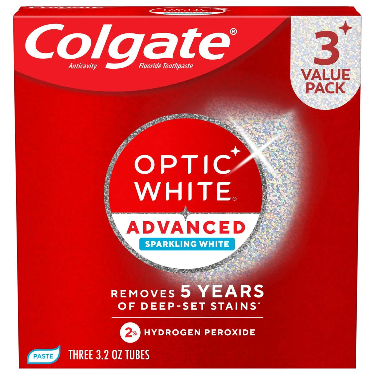 Three white toothpaste tubes in rectangular cardboard packaging