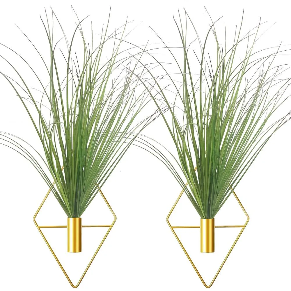 Two gold diamond-shaped metal vases with pink artificial shrubs and wheat grass, 50H x 15W x 15D cm