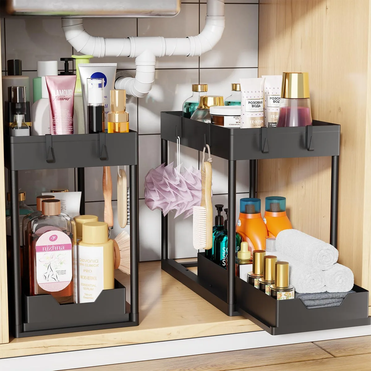 Two black painted two-tier under-sink organizers with sliding lower drawer
