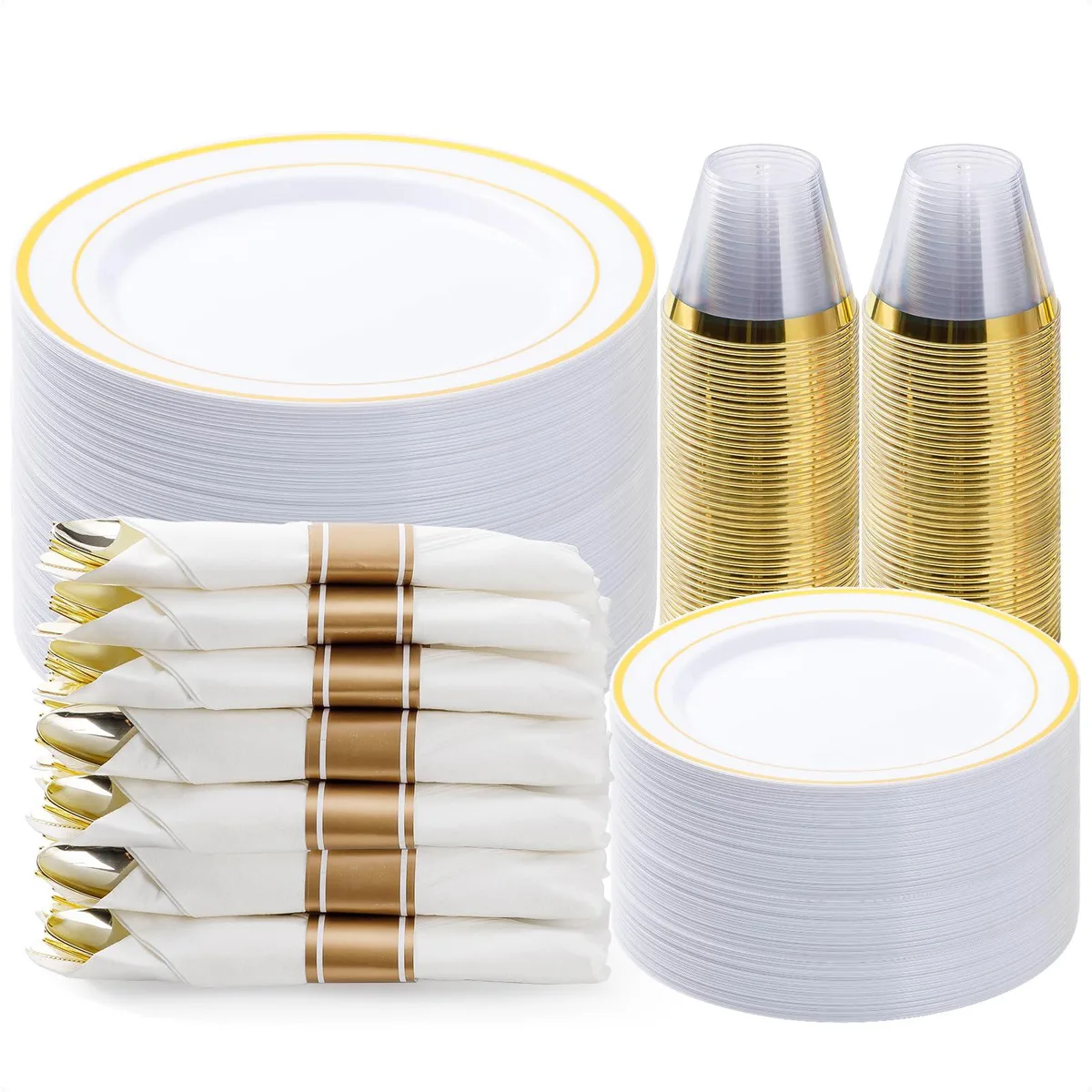 Gold-rimmed white plastic plates, gold cutlery in rolled napkins, and clear cups packed in a rectangular box