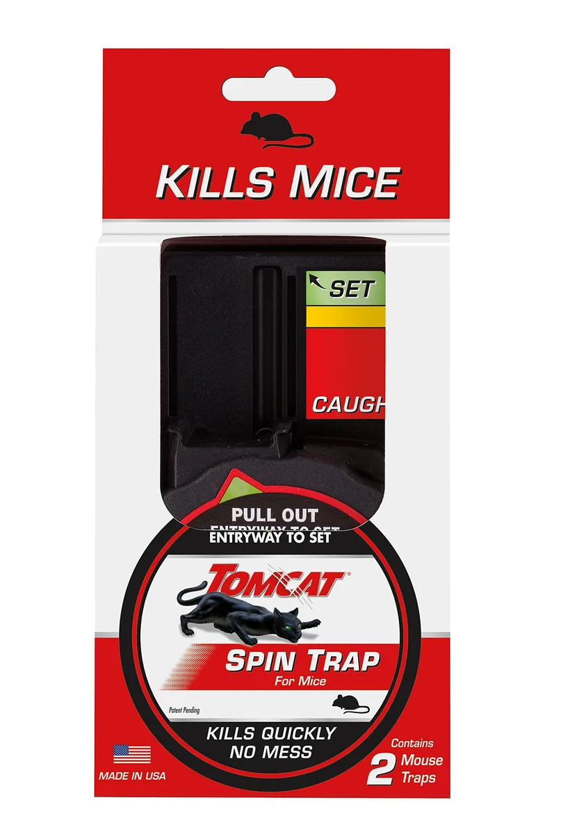 Two white enclosed mouse traps with bait cups and caught indicators