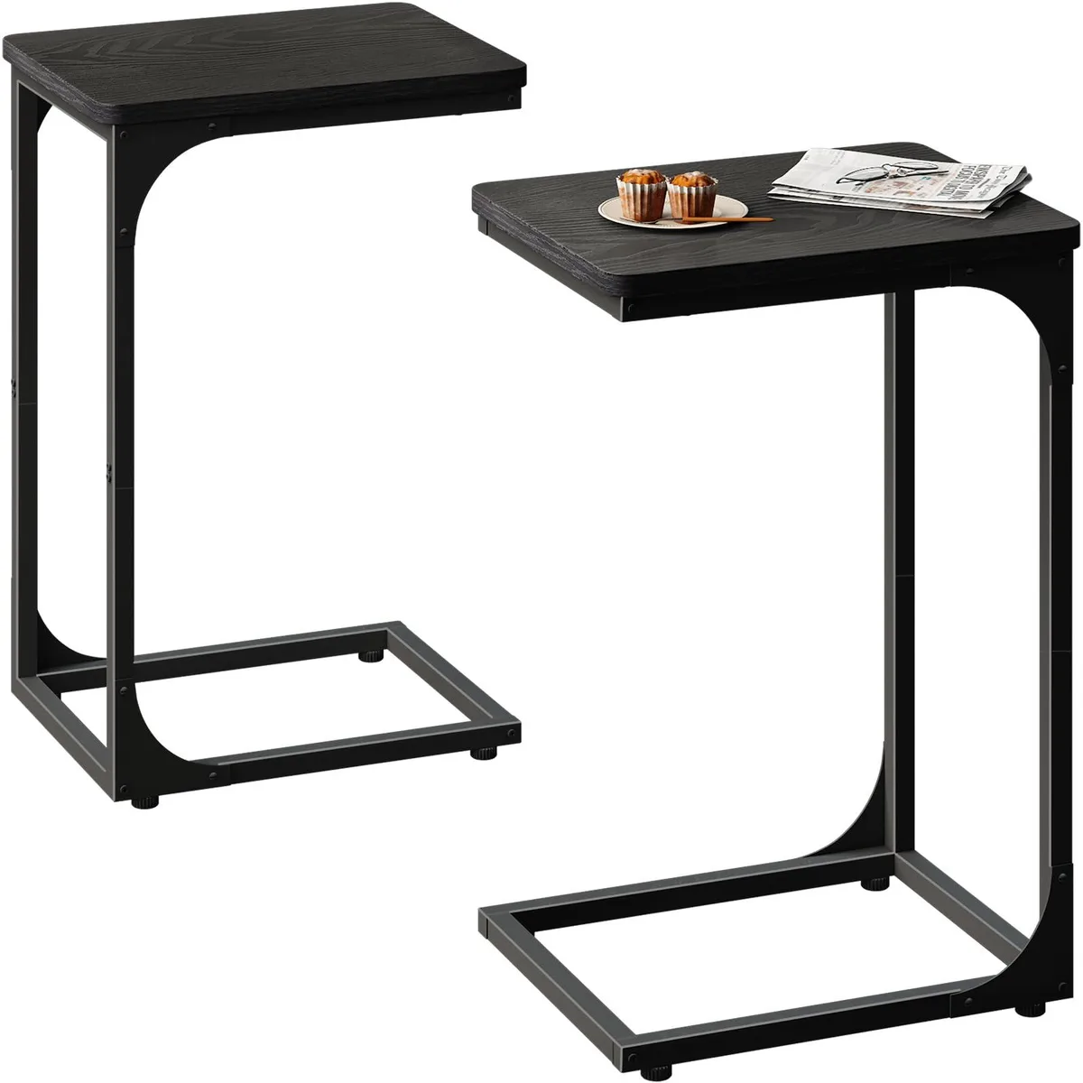 Two black C-shaped side tables with semicircular tops and straight metal legs