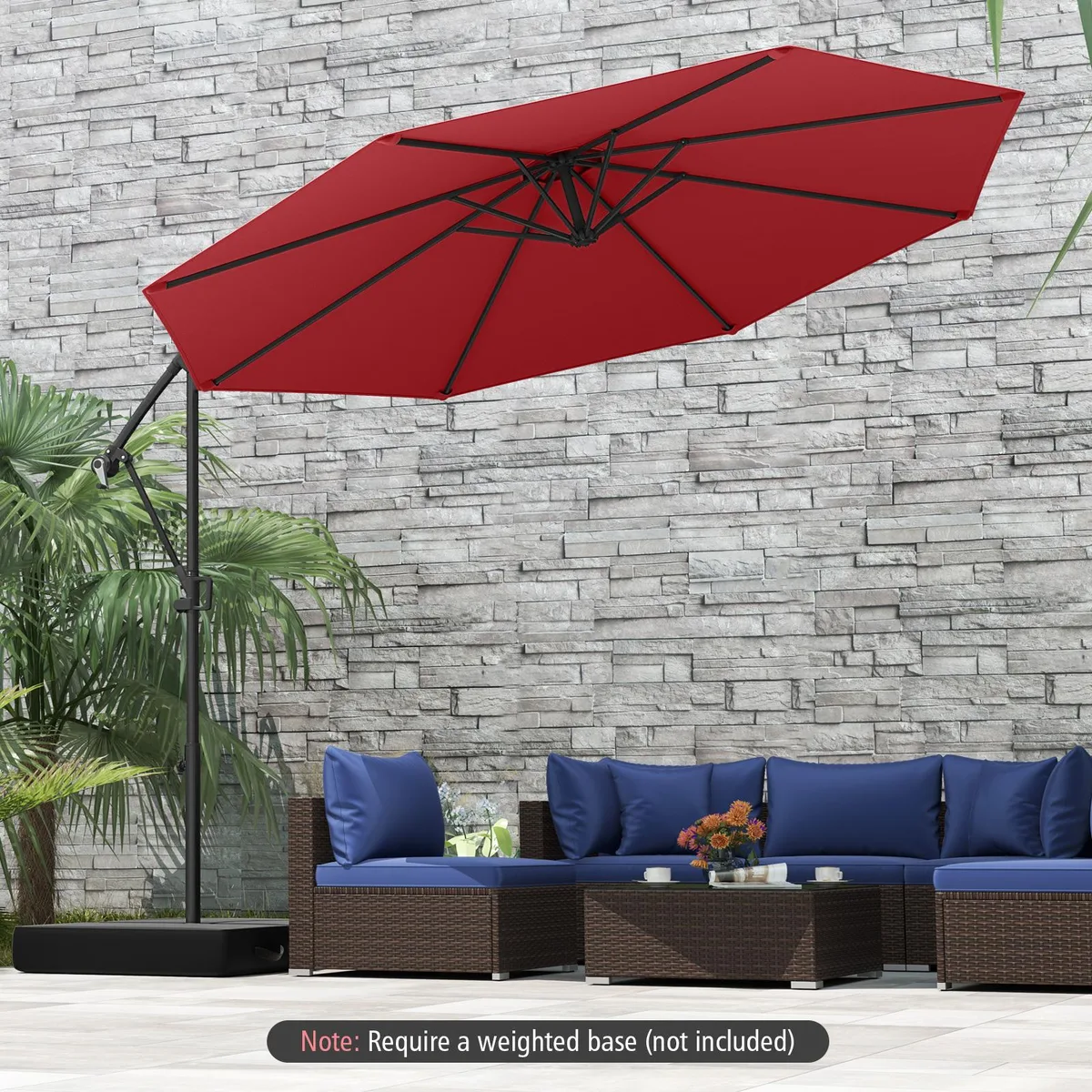Wine-coloured offset patio umbrella with metal frame, crank handle, air vent and base