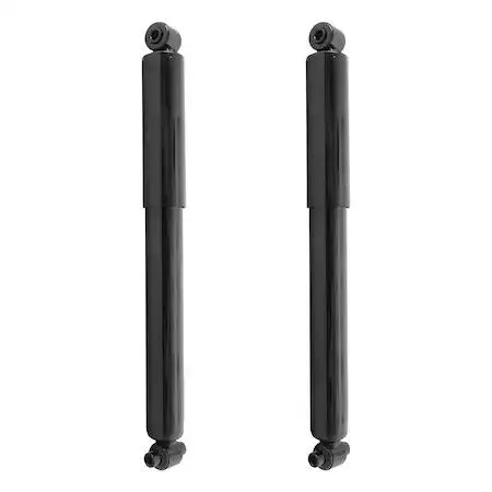 A pair of silver rear shock absorbers in a Unity kit box