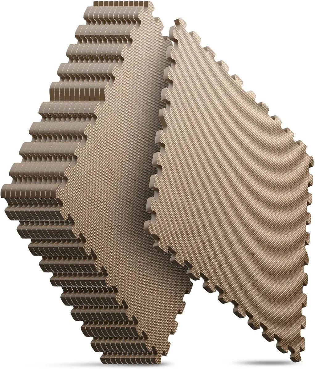 Thirty-two brown foam tiles with puzzle edges and textured surface laid out on a floor