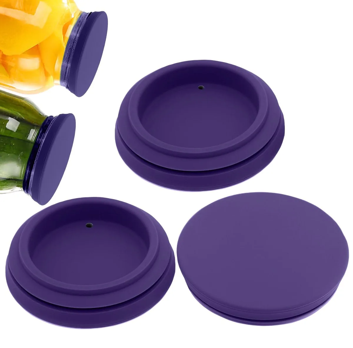 Three violet silicone canning lids with built-in vent membranes, regular mouth size