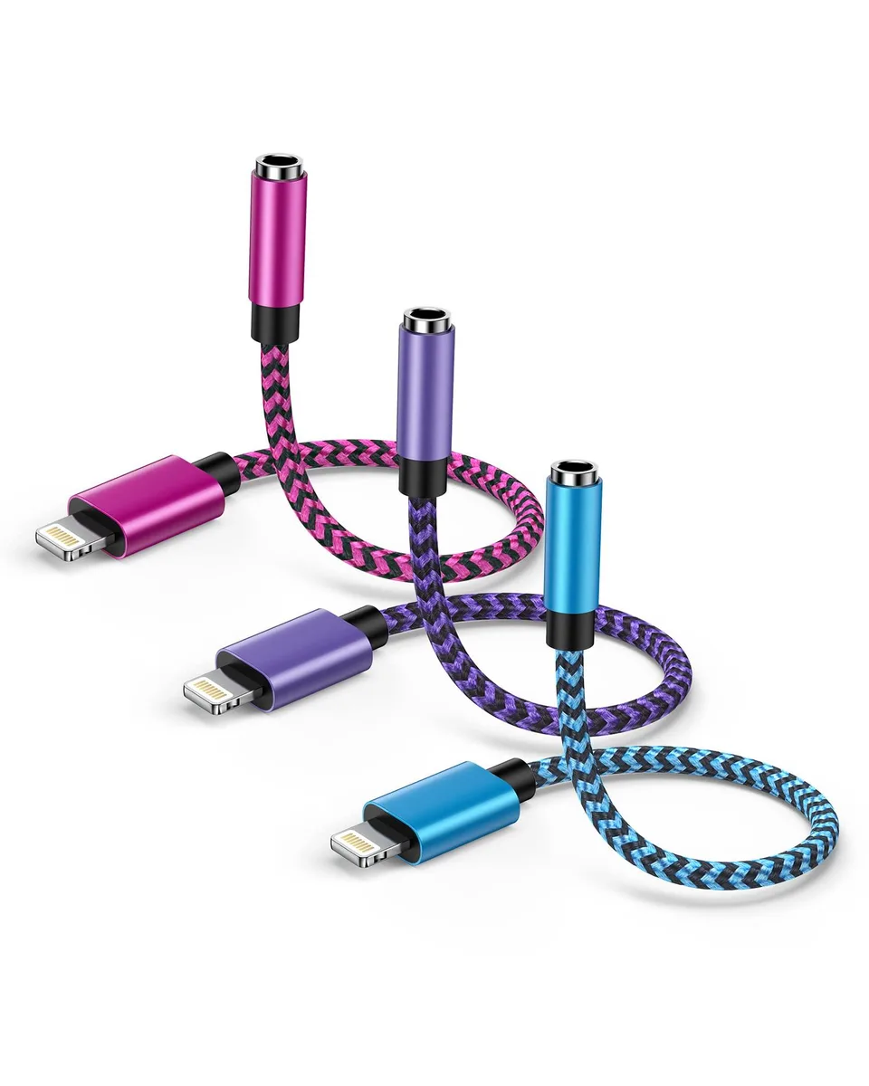 Three white Lightning-to-3.5mm adapter dongles with braided cables