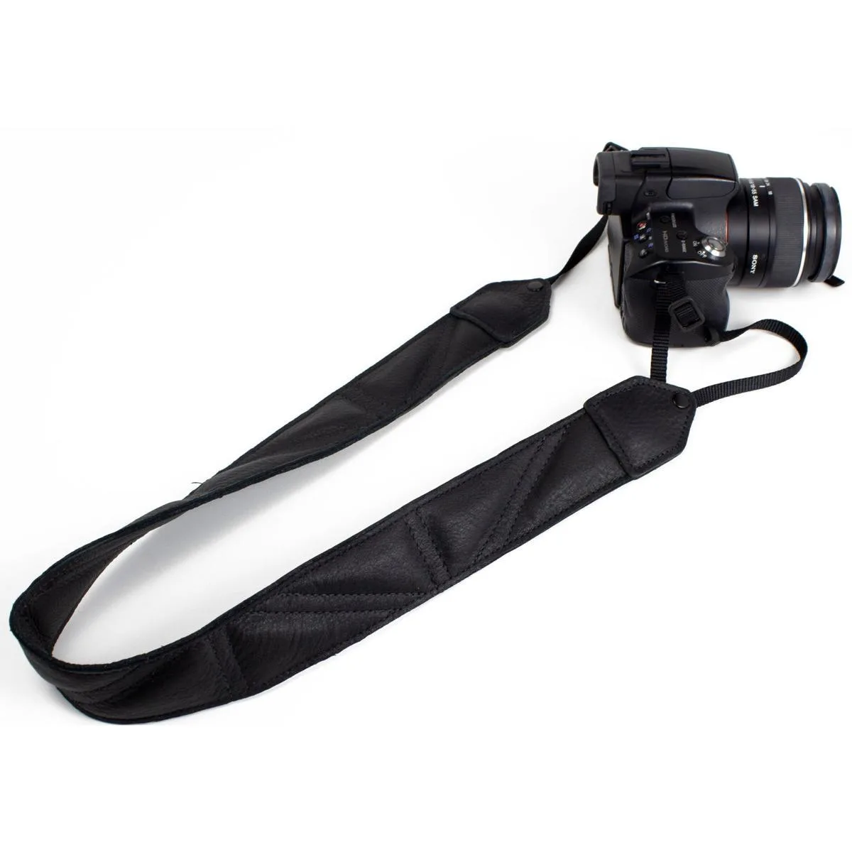 Black leather camera strap with triangle stitching, adjustable length 45 to 55 inches