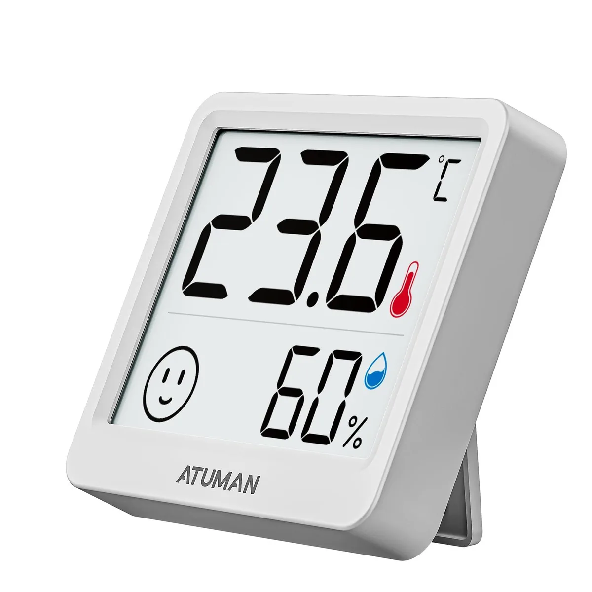 Small white rectangular digital thermometer hygrometer with LCD display showing temperature and humidity readings