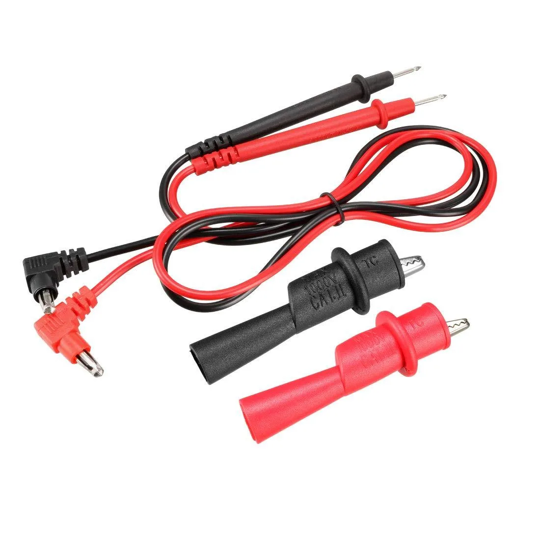Red and black silicone test leads with probes and matching alligator clips, coiled on a surface