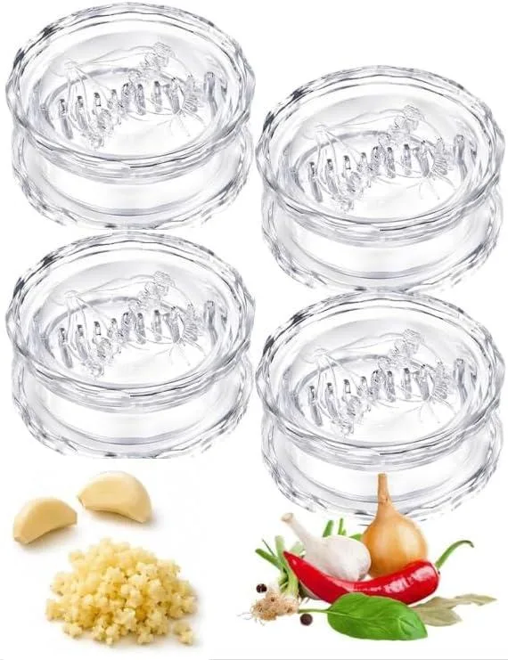 Four clear plastic garlic presses with twist handles and transparent bodies