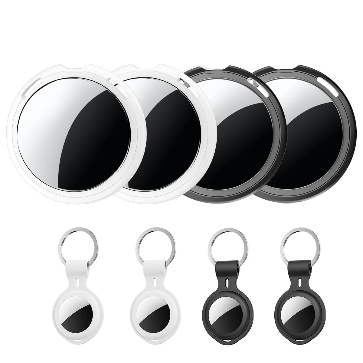 Four small square Bluetooth tracker tags in black and white with matching silicone cases