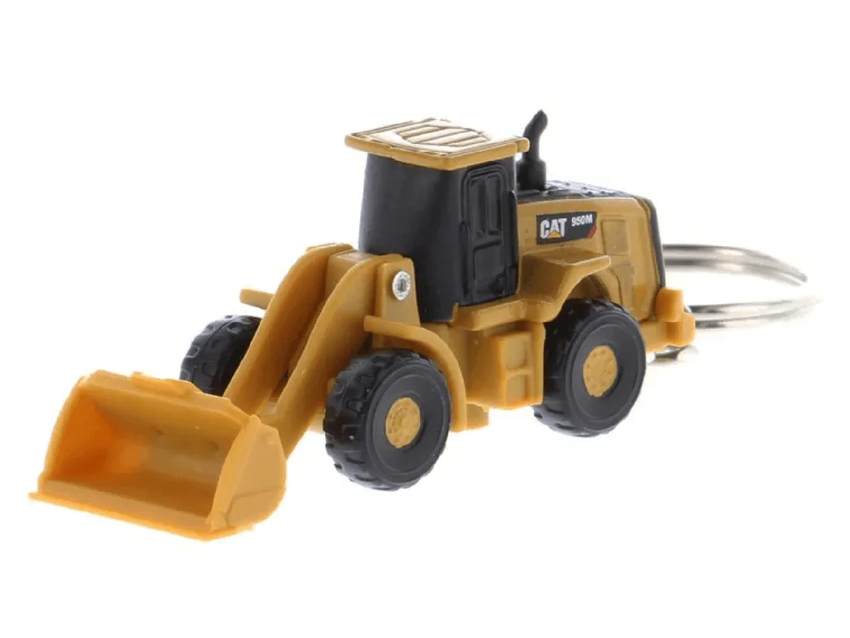 Yellow diecast CAT 950M wheel loader keychain, 2.125 inches long, functional loading arm, blister pack