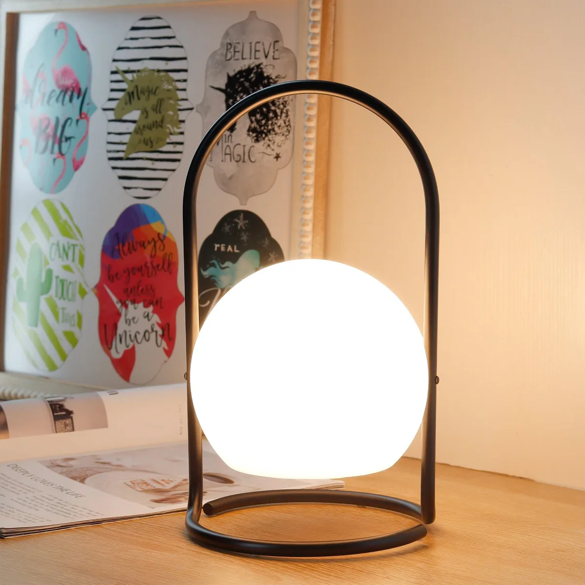 Metal lantern table lamp with retractable handle, cordless design