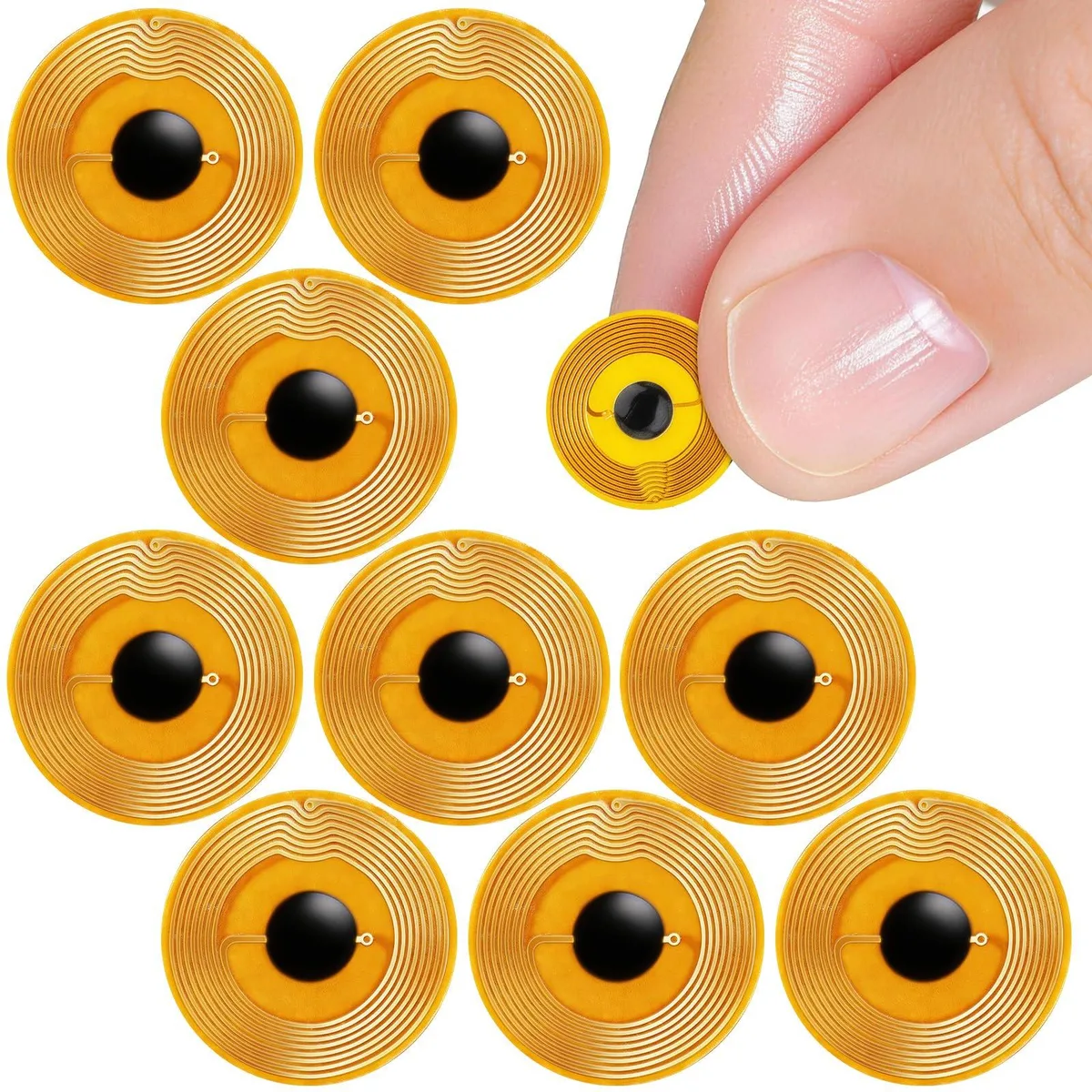 Ten tiny round white NFC stickers on a sheet