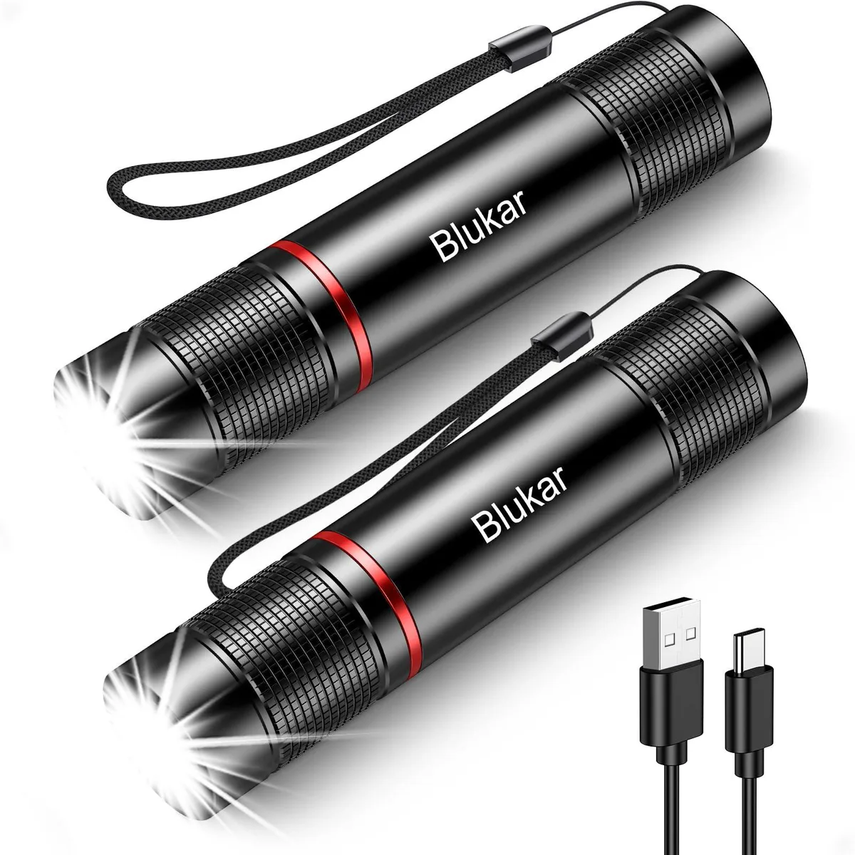 Two black cylindrical aluminium flashlights with USB-C ports, shown side by side