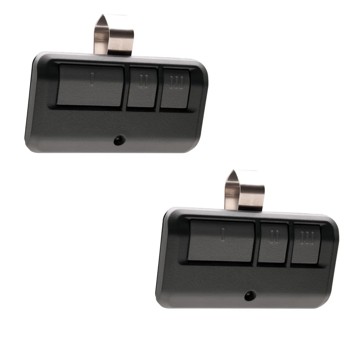 Two small rectangular remotes with visor clips and a manual