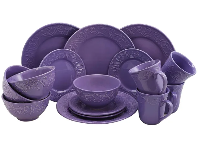 Lilac stoneware dinnerware set, sixteen pieces with embossed plates bowls and mugs