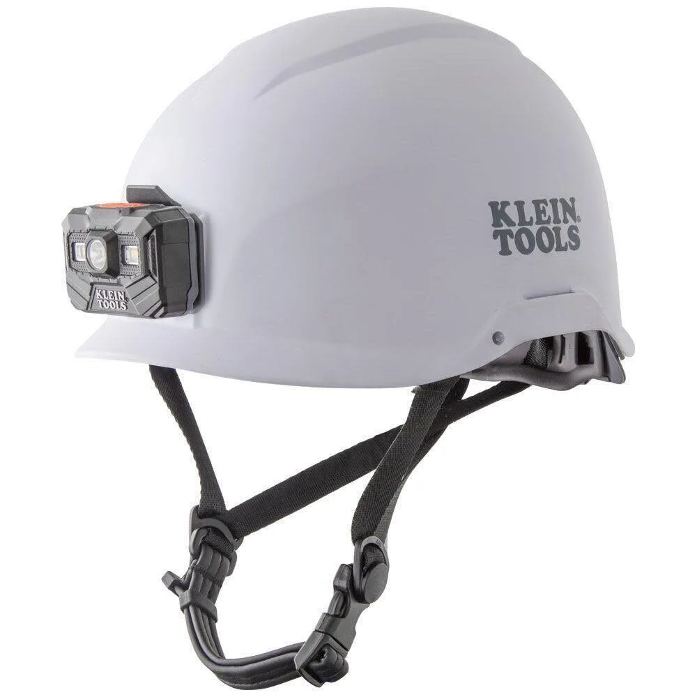 White non-vented safety helmet with integrated rechargeable headlamp