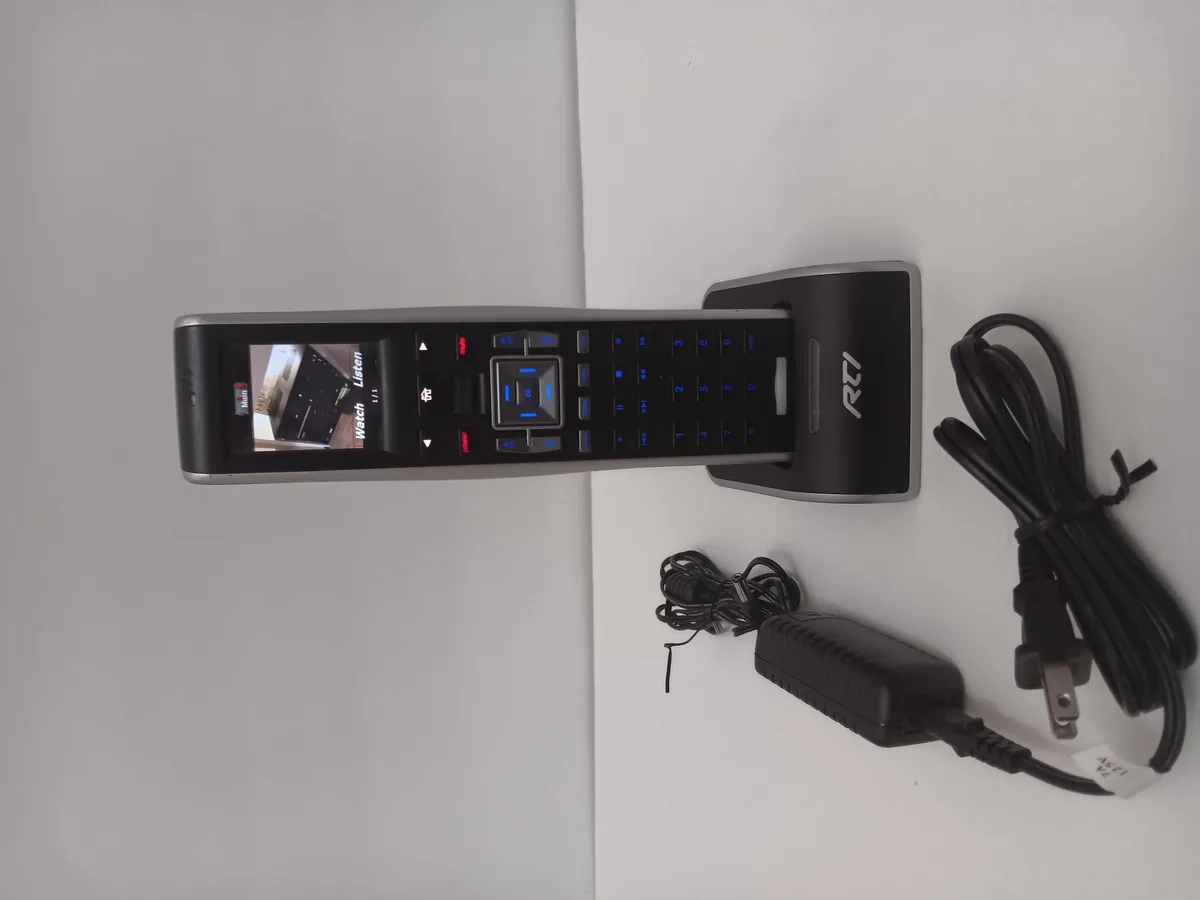Slim black universal remote with colour touchscreen and hard buttons, 100 ft range, 9.6 oz