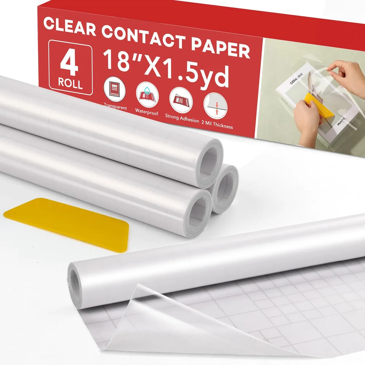 Four rolls of clear adhesive contact paper on cardboard cores
