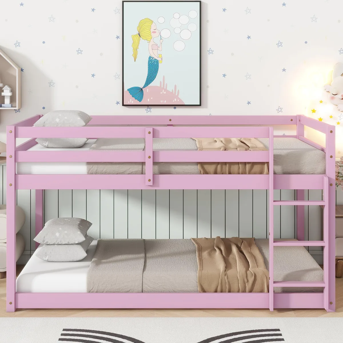 Pink rubber wood twin-over-twin floor bunk bed with ladder and slatted platforms