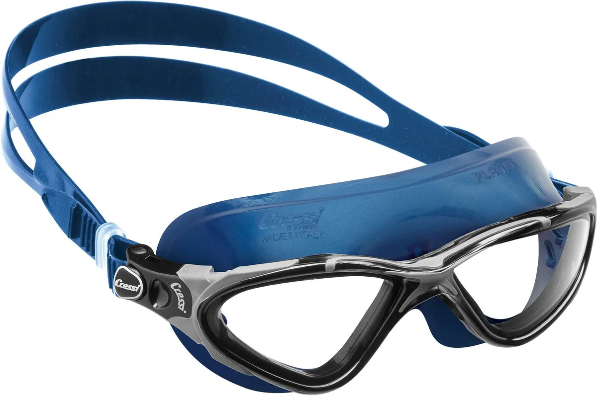 Box of twelve clear-lens safety goggles with blue frames and silicone straps