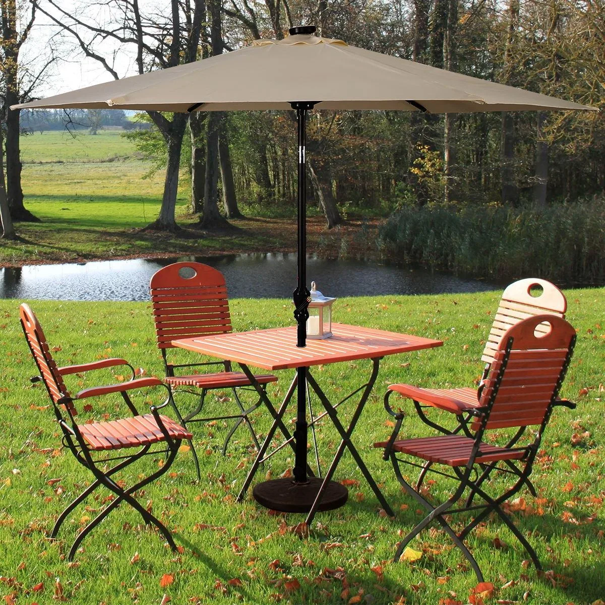 Beige 9 ft patio umbrella with steel pole, crank lift, tilt and 18 solar LEDs