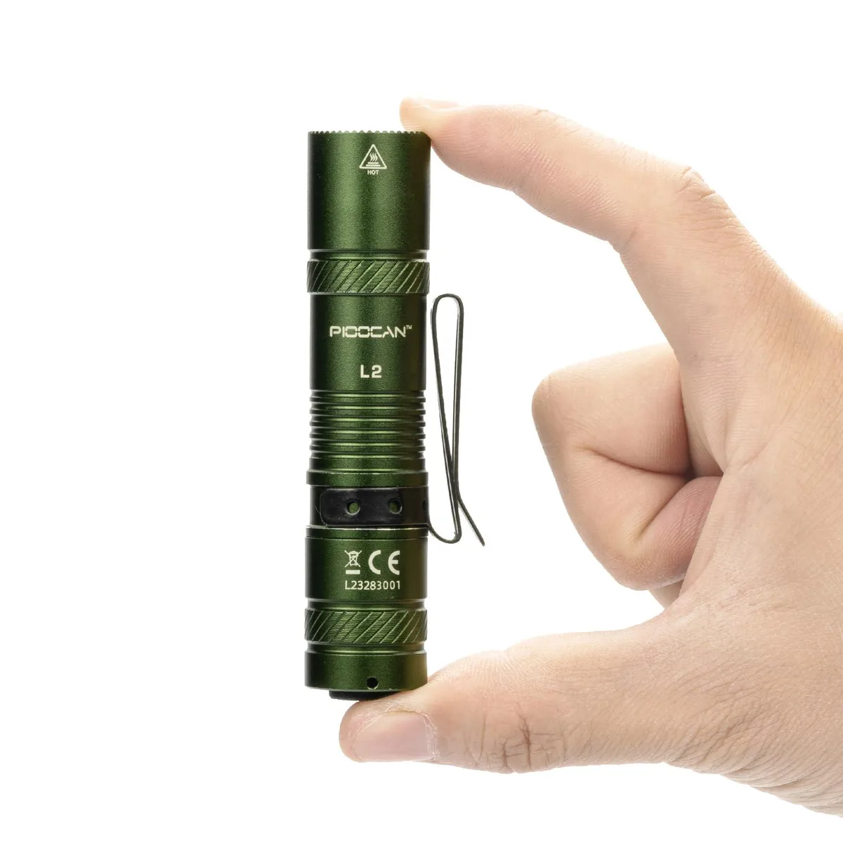 Small green aluminium flashlight with pocket clip, 3.72 inches long