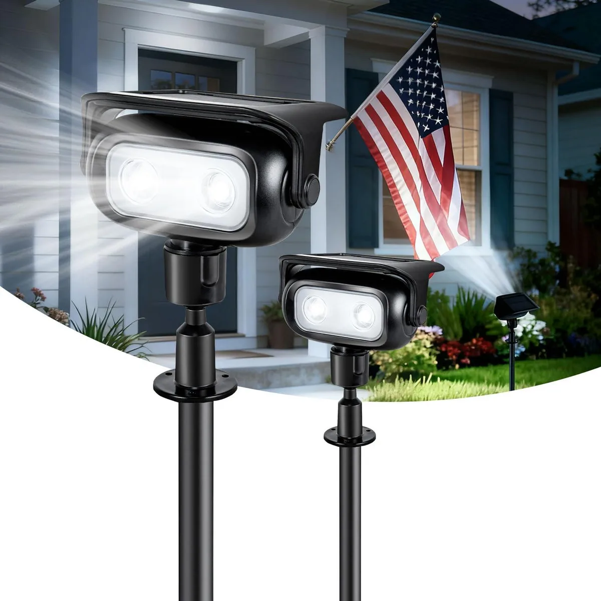 Two robot-style solar spot lights, resin finish, adjustable panels and heads