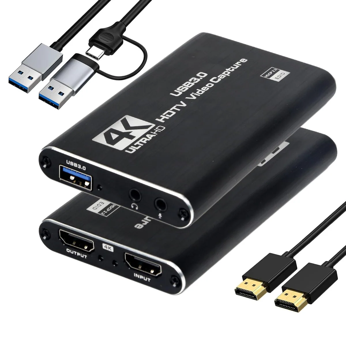 Small black aluminium capture box with HDMI ports and 3.5 mm jack