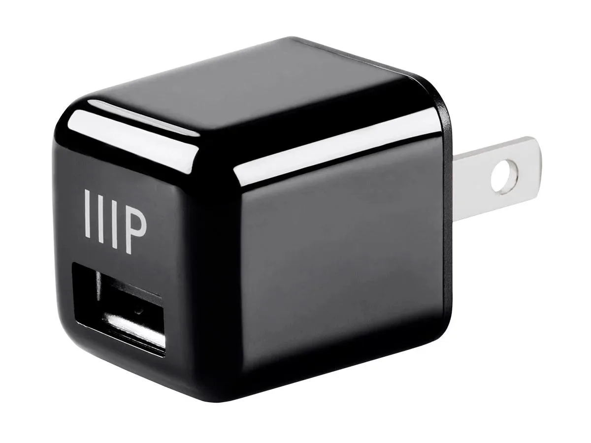 Small white cube USB charger with fold-out prongs