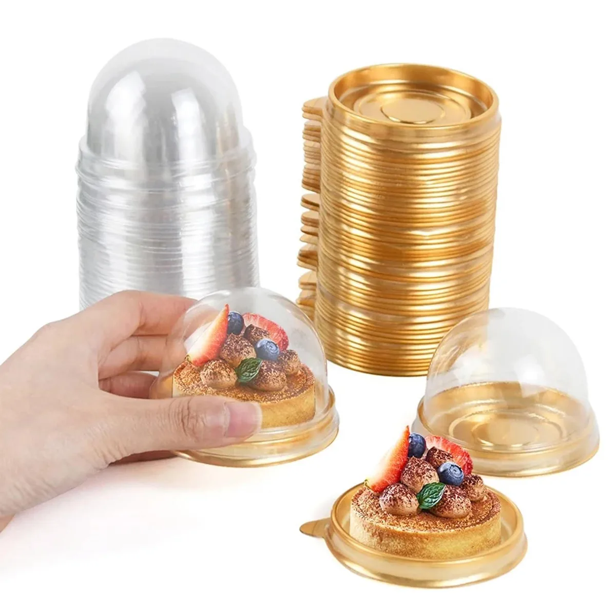 Clear plastic mini cake boxes with gold bases and dome lids, fifty sets