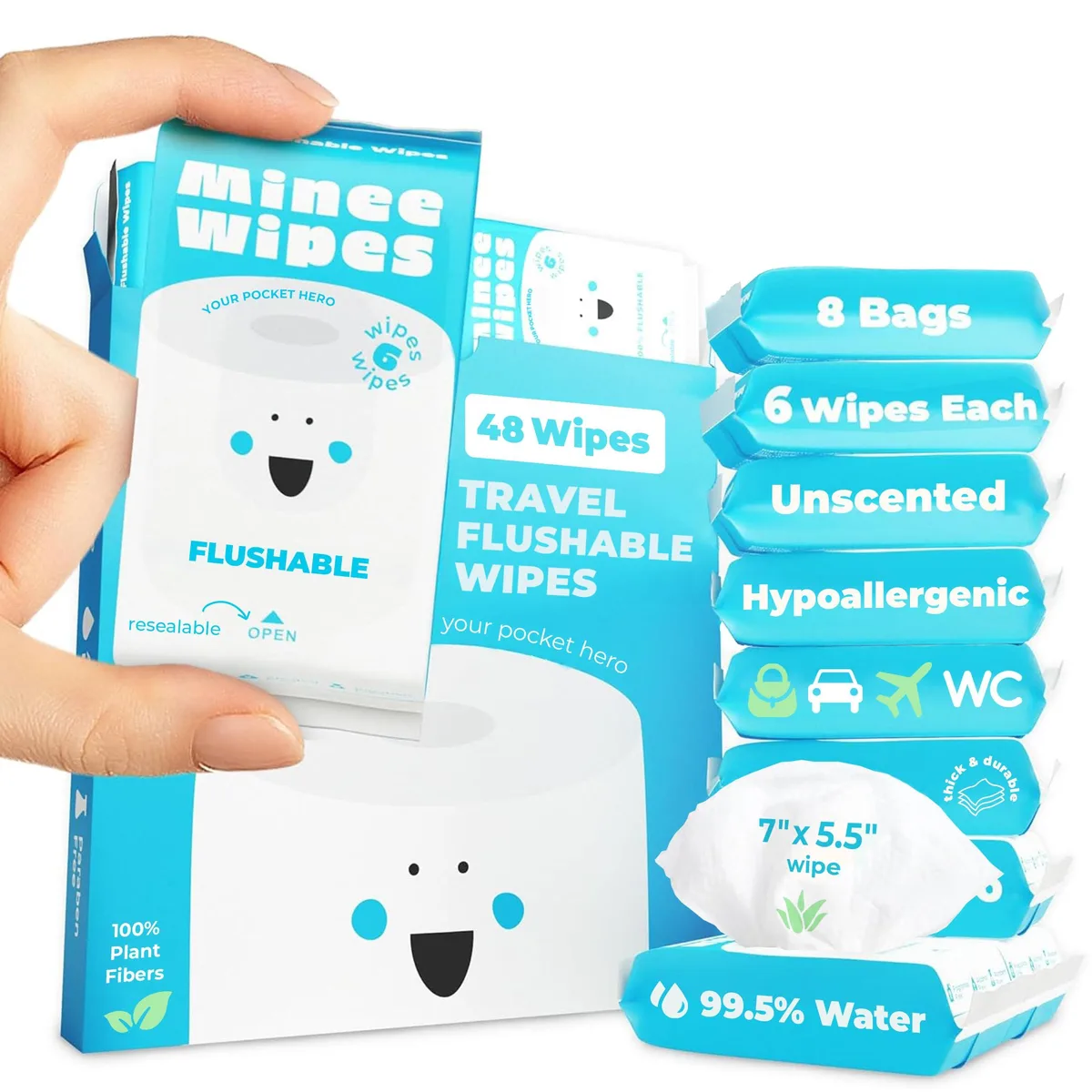 Eight small white resealable packs of flushable wipes on a light surface