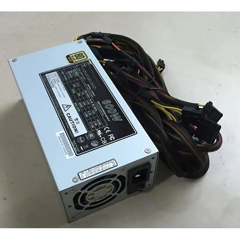 Silver 2U rackmount power supply unit with rear fan grille and power socket