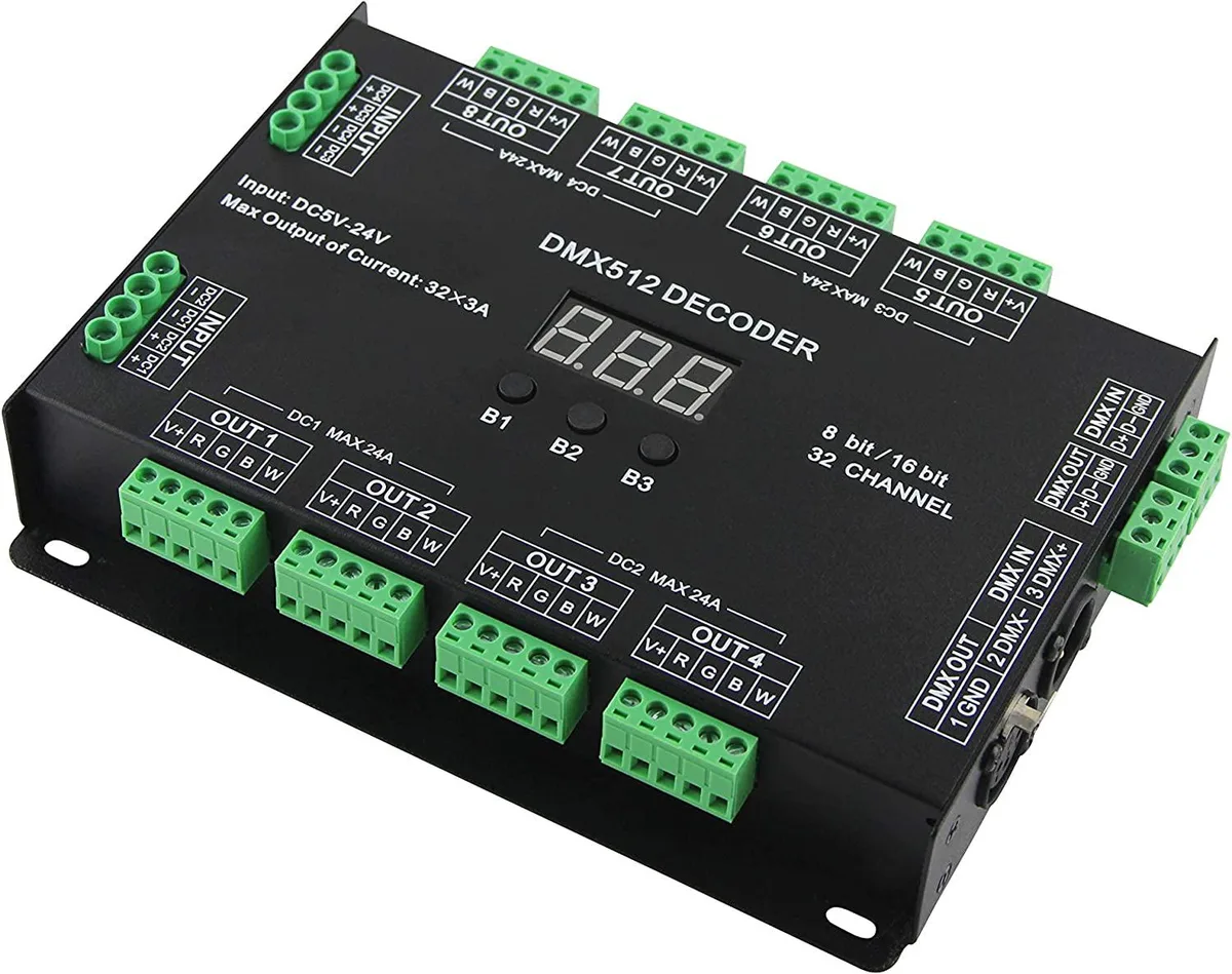 Compact black DMX decoder with digital display and terminal blocks