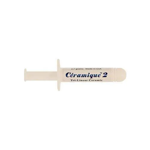 White syringe containing 2.7 g ceramic thermal compound