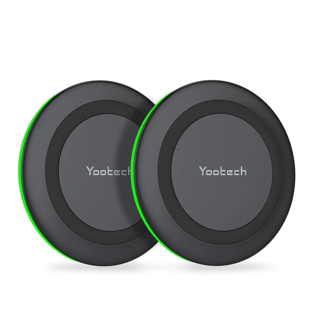 Two black circular wireless charging pads side by side