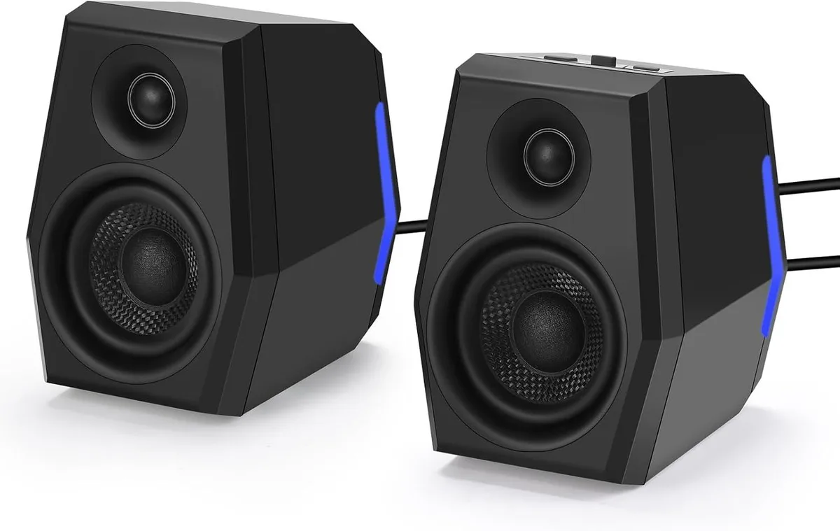 Black column speaker angled 10 degrees with RGB lighting