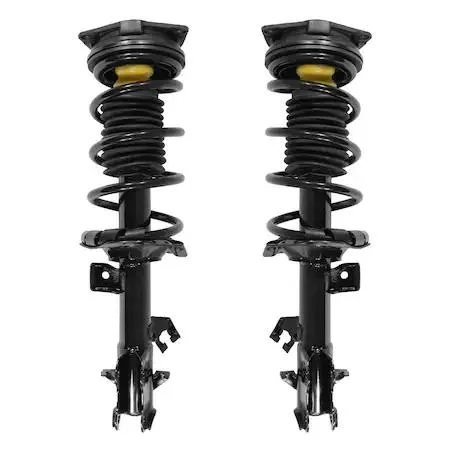 Pair of silver front strut assemblies with coiled springs and top mounts, new in box