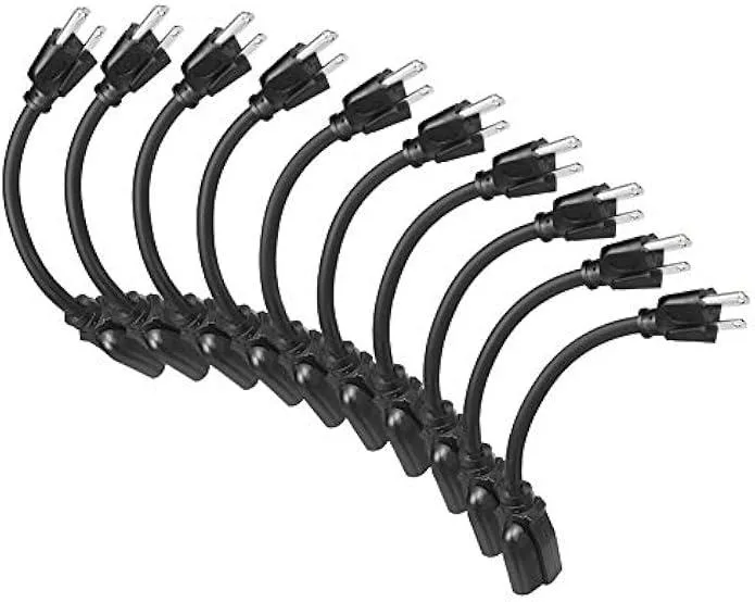Ten black short power cords with three-prong plugs and sockets, coiled together