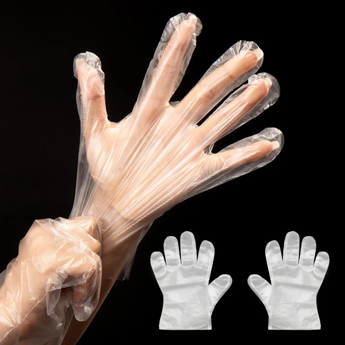 Clear disposable plastic gloves in a bulk pack of 400