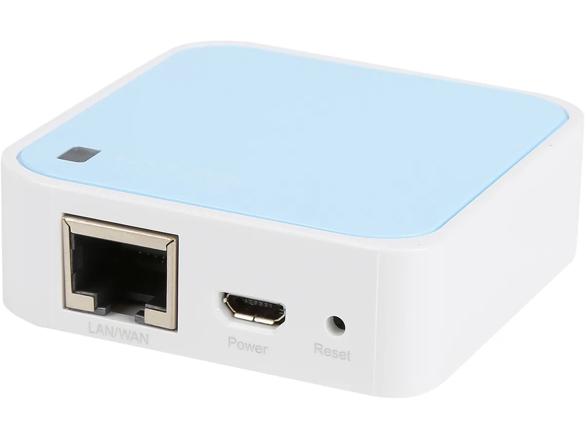 Small white square router with rounded corners and micro USB port