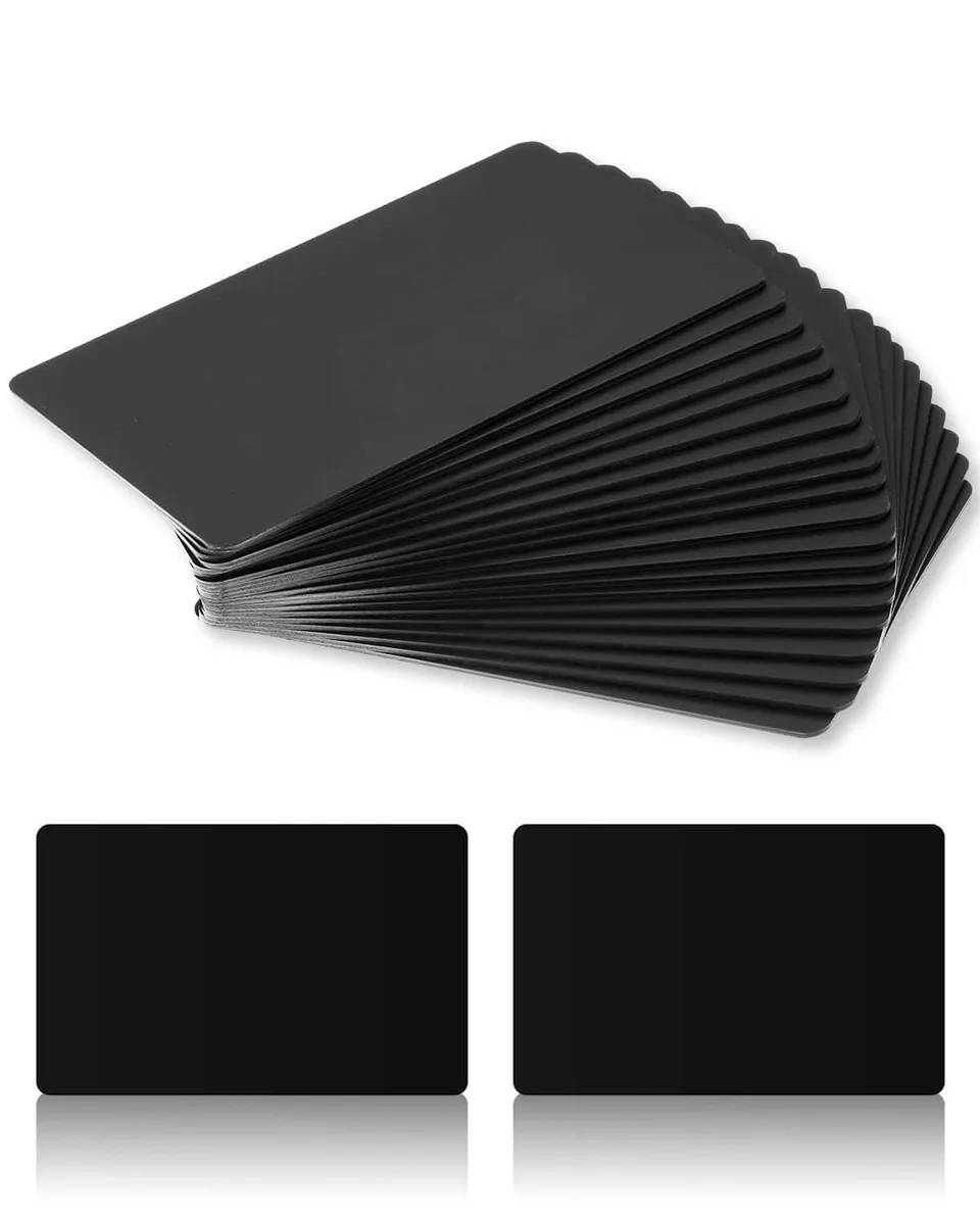 Twenty glossy black PVC NFC cards in a rectangular stack