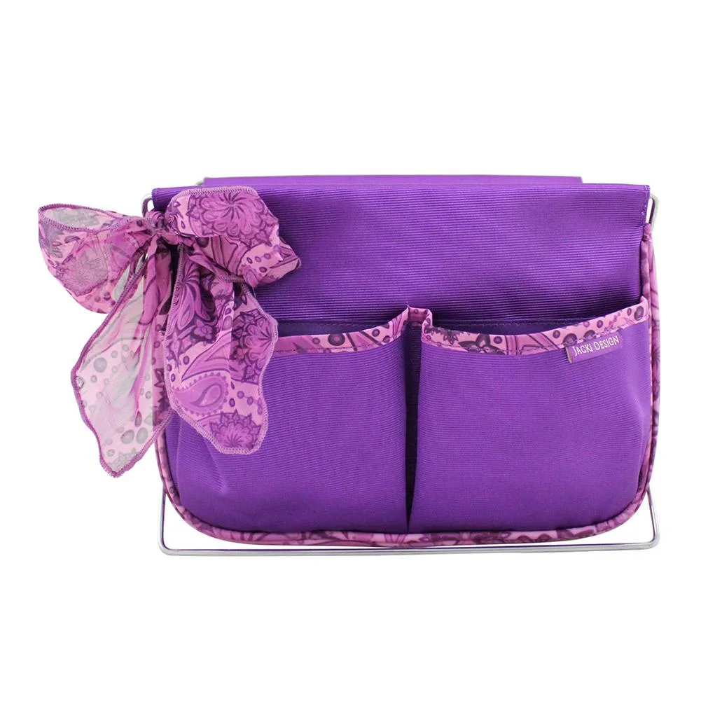 Purple fabric organizer with one large compartment and two front slip pockets, folded flat