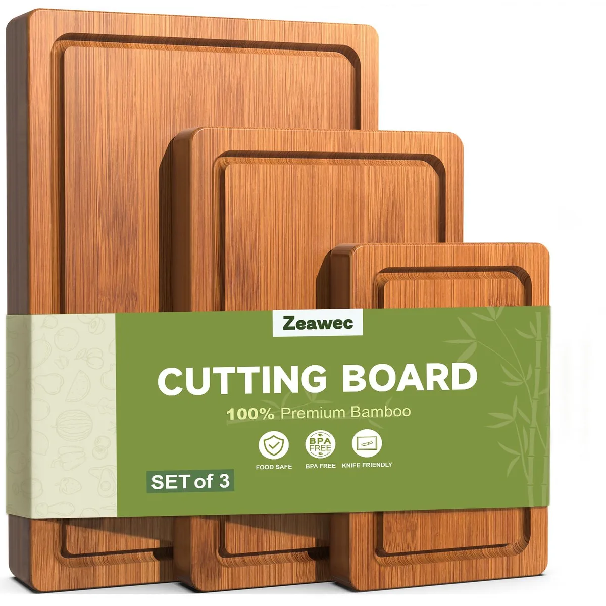 Three rectangular bamboo cutting boards in graduated sizes, dark carbonized finish, deep juice grooves visible