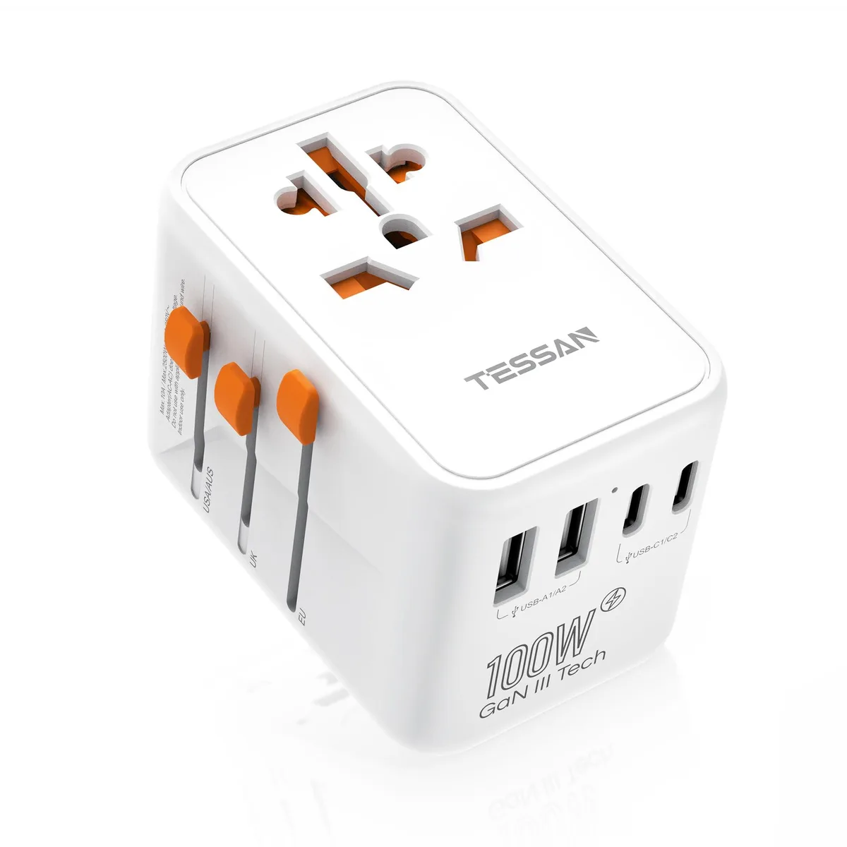 Compact cube travel adapter in orange and white with sliding plug pins and multiple USB ports