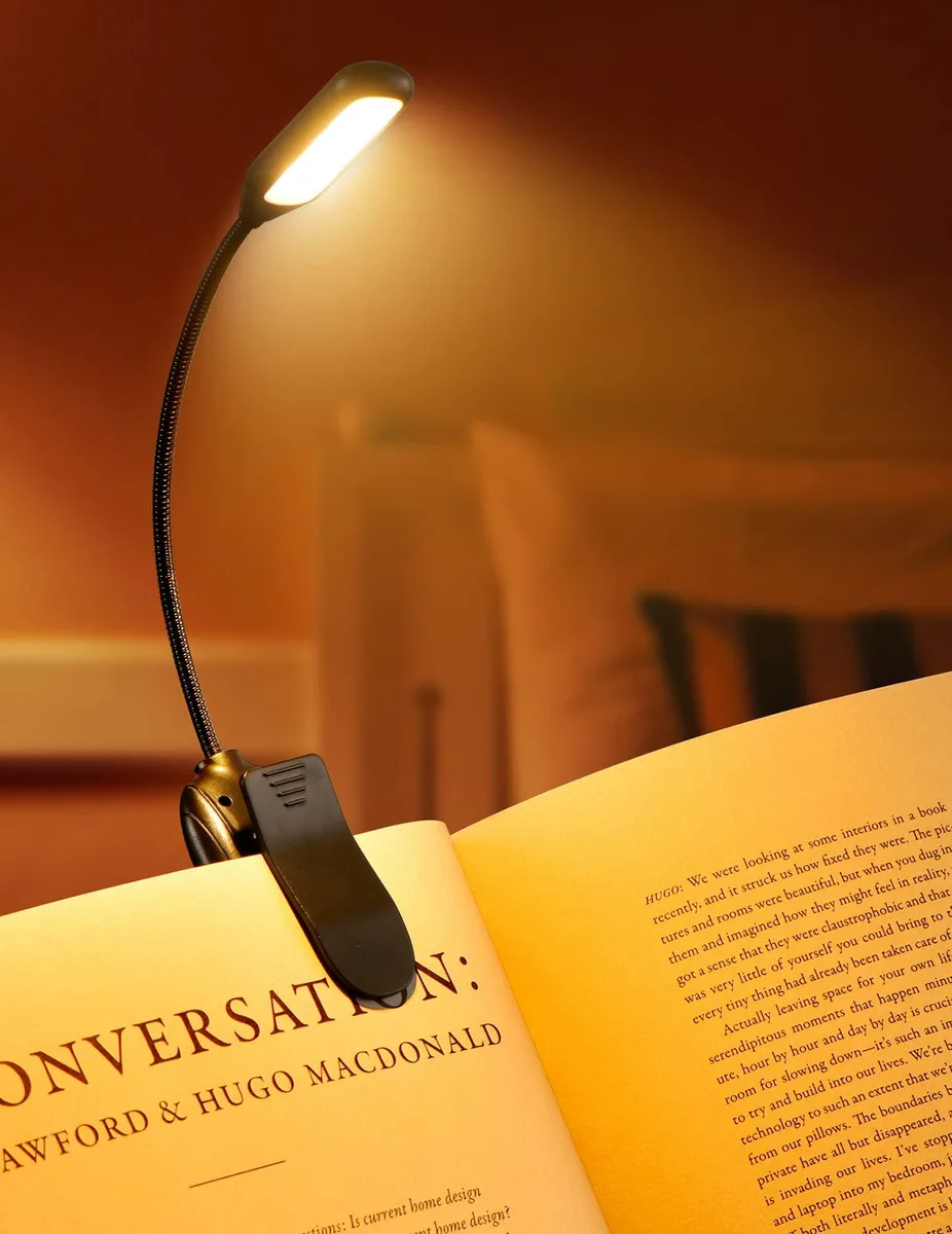 Ultralight clip-on book light with flexible metal gooseneck and padded clamp